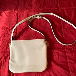 Brand New Miche Cross body with an adjustable strap.